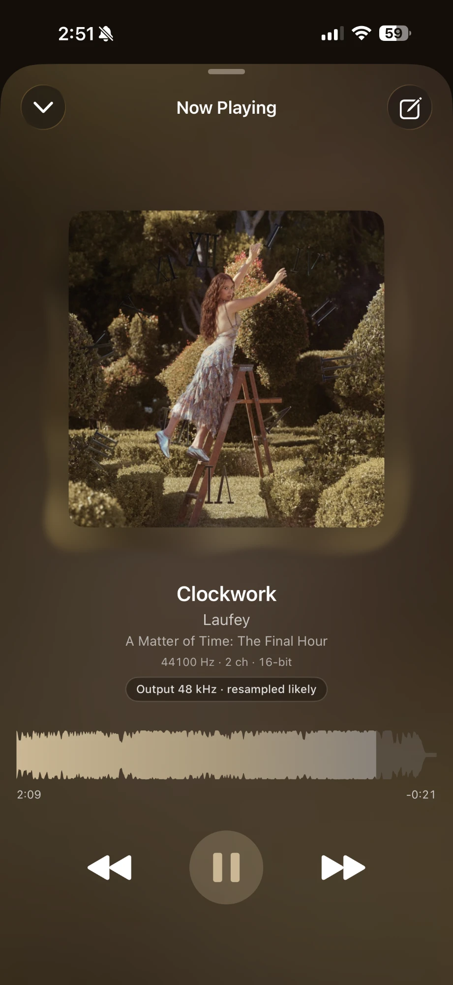 Kord's Now Playing screen showing 'Clockwork' by Laufey with album artwork, a waveform scrubber, and a lossless audio signal-path badge